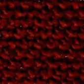 Burgundy looped pile fabric texture with irregular loops, exhibiting tonal variations from brownish-red to saturated burgundy, and a nubby surface.